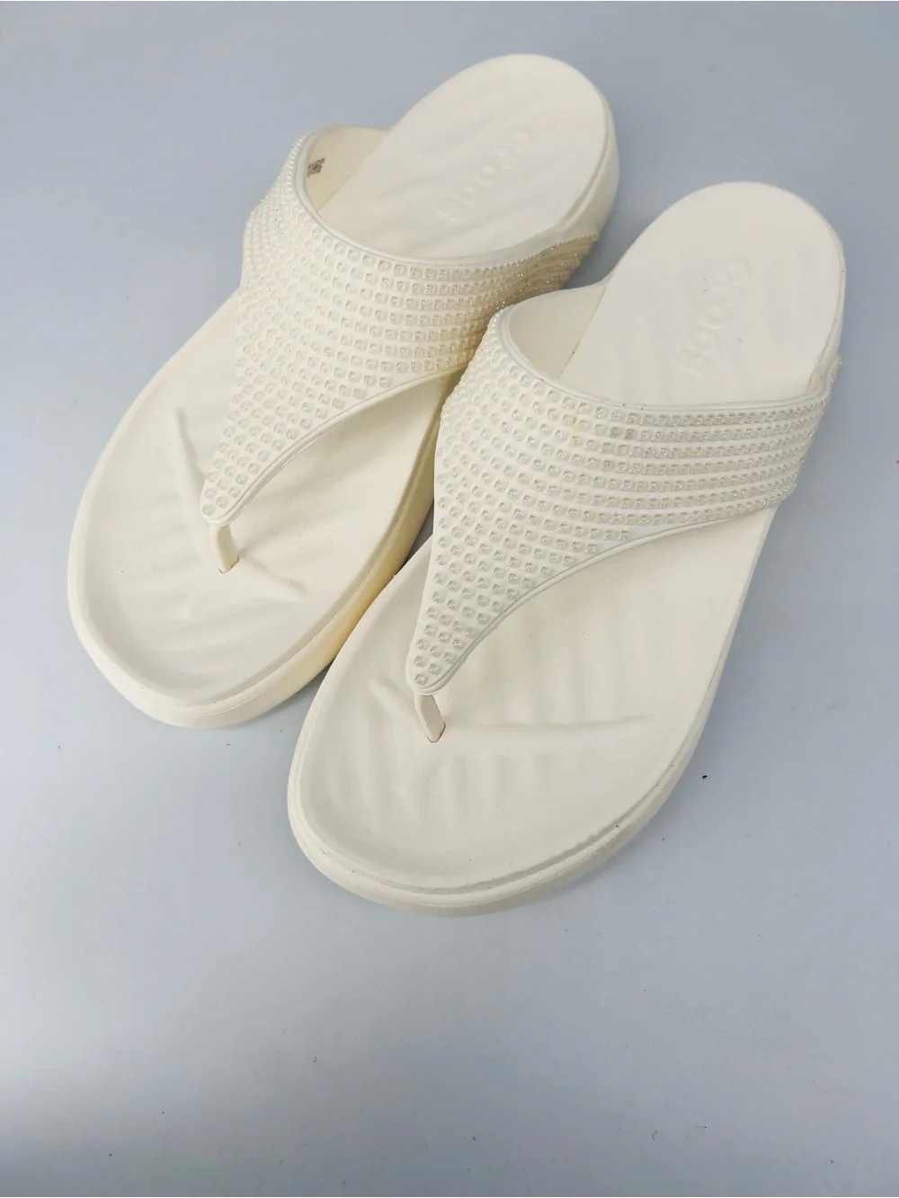Crocs women’s getaway gems flip flops- chalk